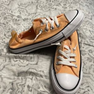 Womens Orange slip on Converse sneakers